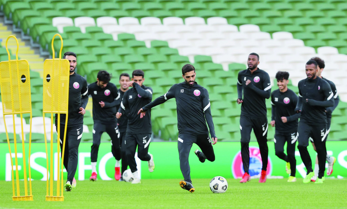 Qatar's captain Hassan Al Haydos kicks the ball during a practice session yesterday. 
