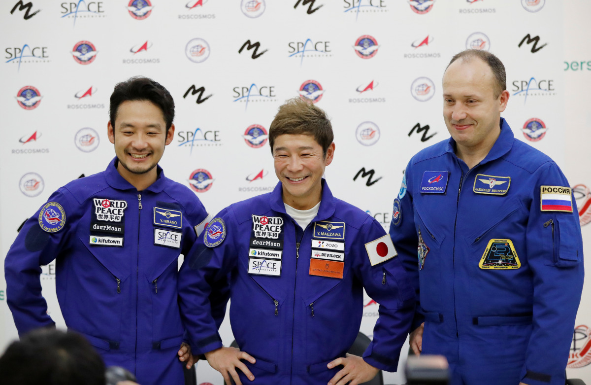Roscosmos cosmonaut Alexander Misurkin and space flight participants Yusaku Maezawa and Yozo Hirano attend a news conference ahead of the expedition to the International Space Station, in Star City, Russia October 14, 2021. Japanese entrepreneur Yusaku Ma