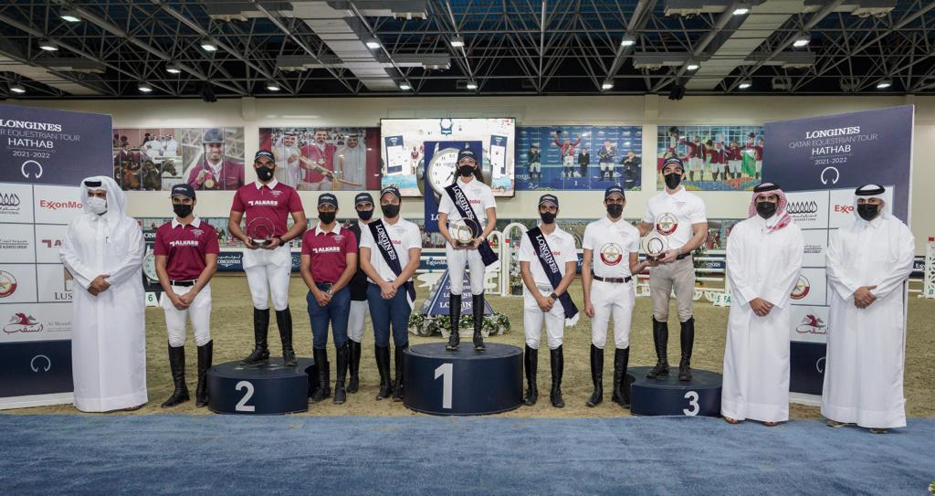 The Podium winners of the Medium Tour Team event with officials during the presentation ceremony on the opening day of the first leg of the Longines Hathab Qatar Equestrian Tour 