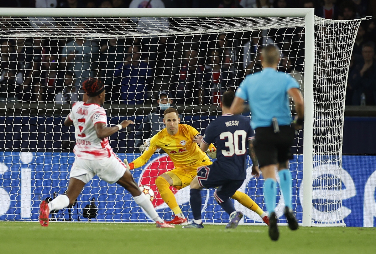 Paris St Germain's Lionel Messi scores their second goal REUTERS/Christian Hartmann
