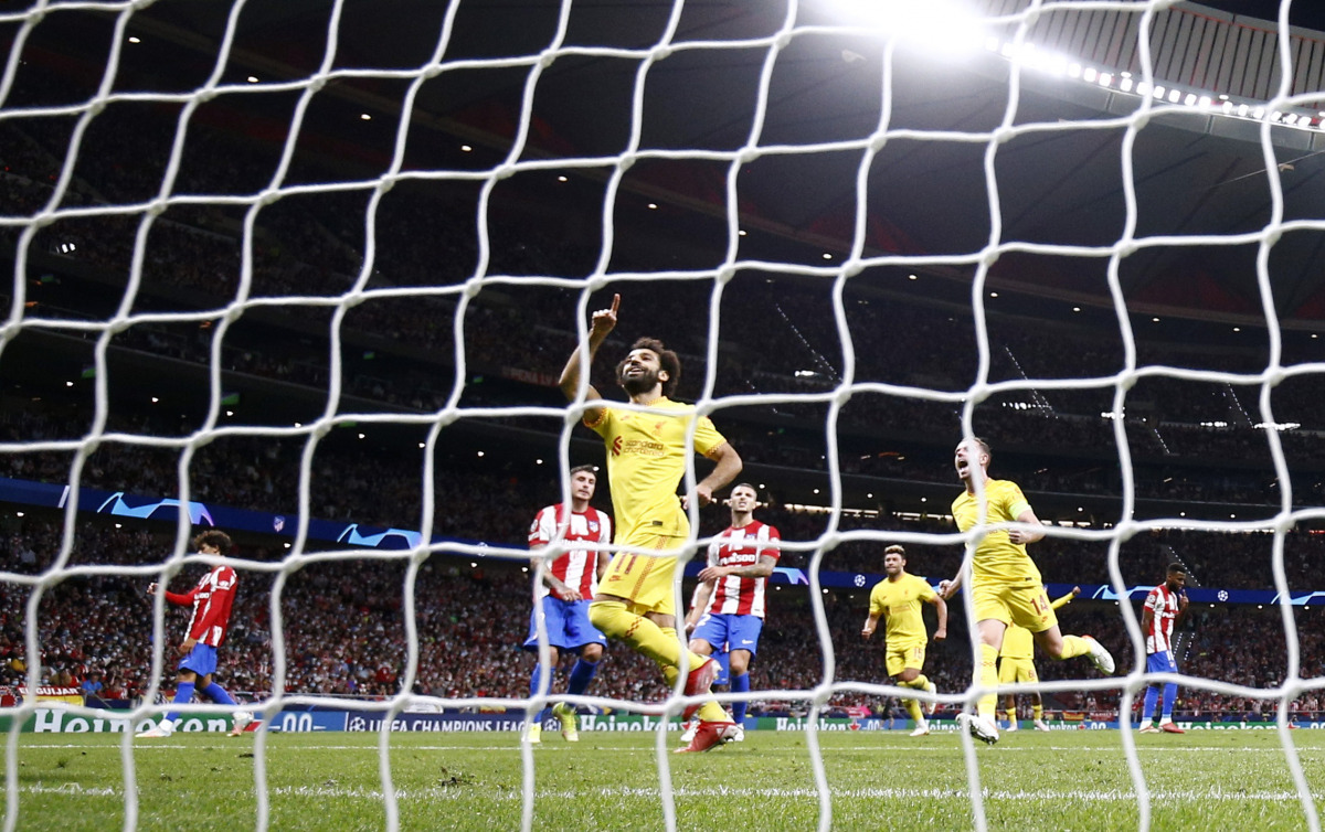 Liverpool's Mohamed Salah celebrates scoring their third goal REUTERS/Sergio Perez