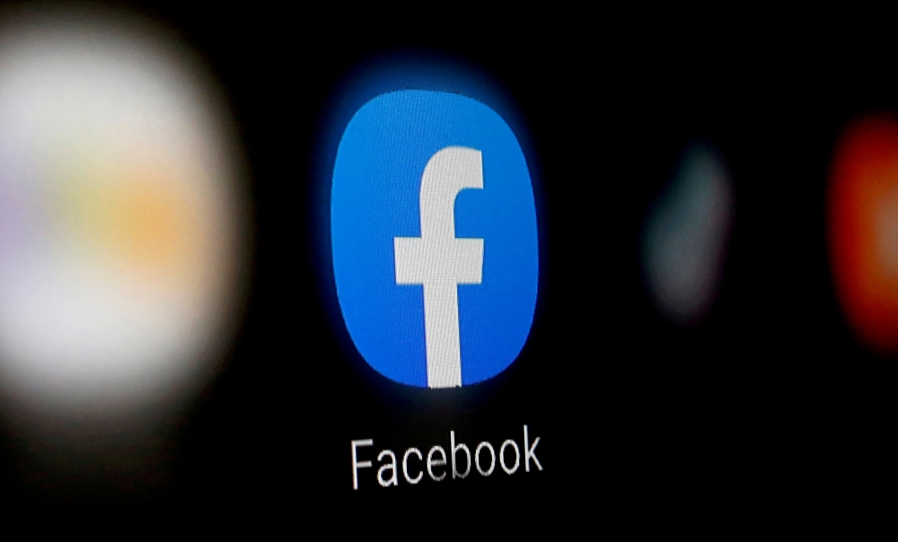 A Facebook logo is displayed on a smartphone in this illustration taken January 6, 2020. REUTERS/Dado Ruvic/Illustration/File Photo/File Photo