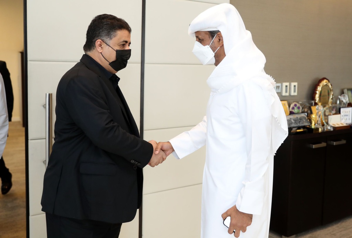 Sheikh Hamad bin Khalifa bin Ahmed Al Thani, President of the Qatar Football Association (QFA) and Sheikh Ahmed Al Eissi, President of the Yemen Football Association (YFA) shake hands.