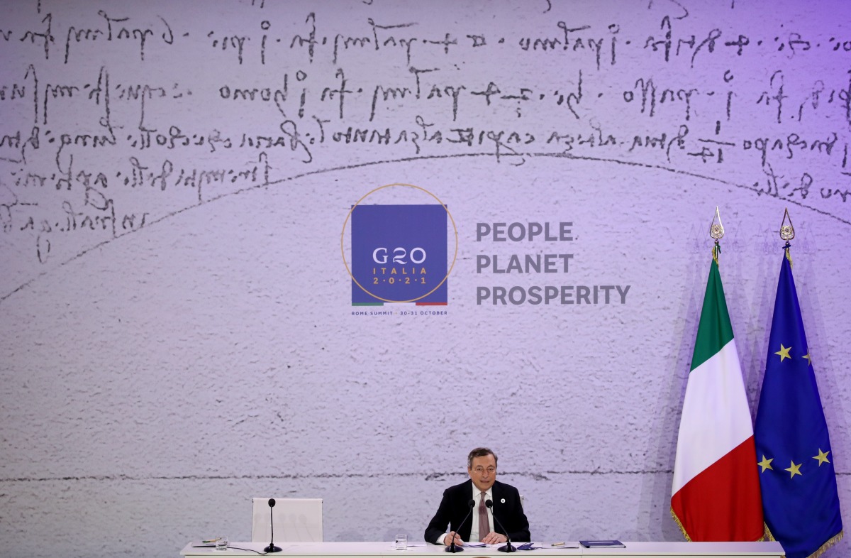 Italy's Prime Minister Mario Draghi speaks during a news conference at the end of the G20 summit in Rome, Italy, October 31, 2021. REUTERS/Yara Nardi
