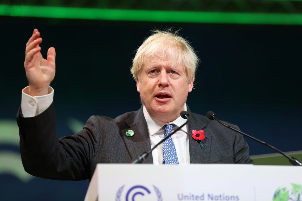 Britain's Prime Minister Boris Johnson speaks during the UN Climate Change Conference (COP26) in Glasgow, Scotland, Britain, November 2, 2021. Steve Reigate/Pool via Reuters