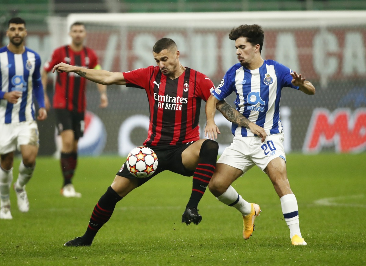 AC Milan's Rade Krunic in action with FC Porto's Vitinha REUTERS/Alessandro Garofalo