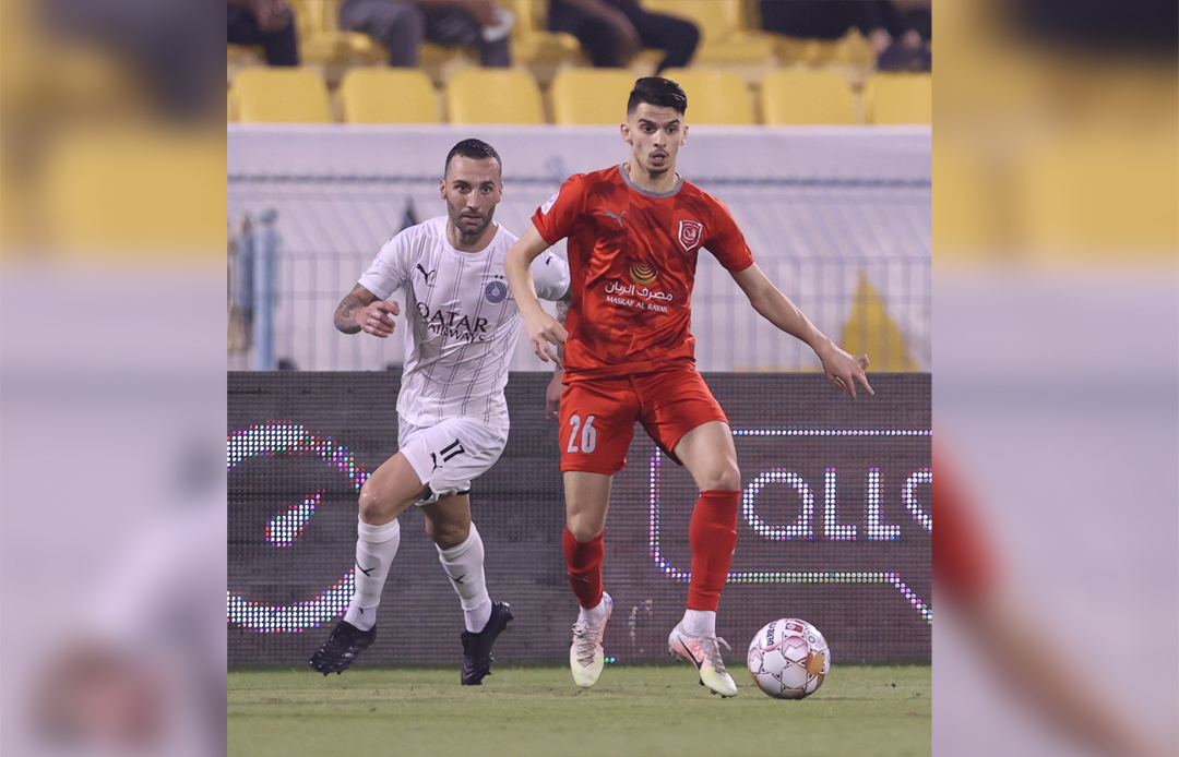 Al Sadd's Guilherme Torres (left) and Al Duhail's Rabeh Yahia Boussafi in action.