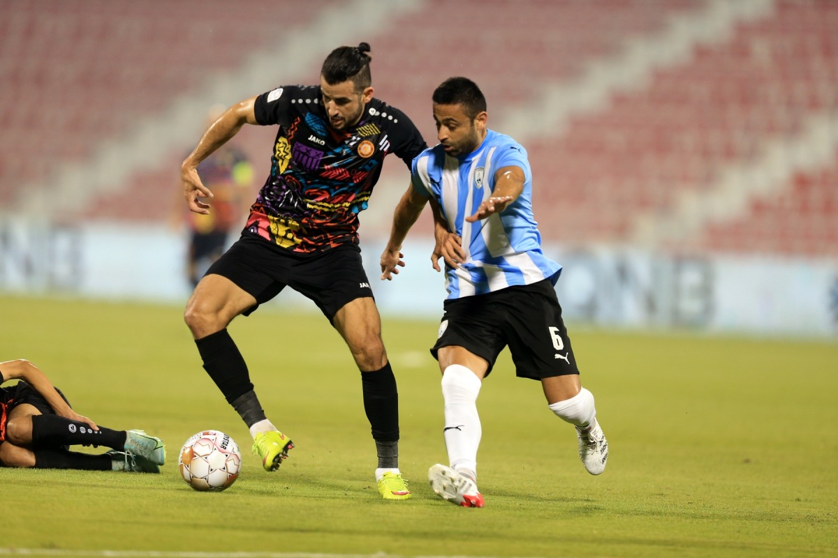 Action during the match between Umm Salal and Al Wakrah yesterday. Pic: Hussein Sayed 
