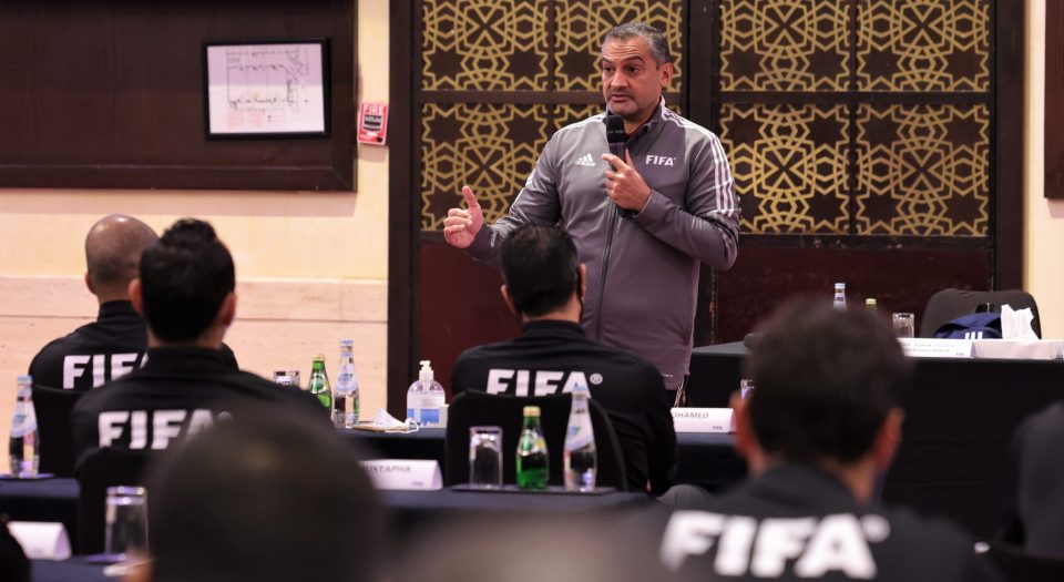 Hani Ballan speaks to participants during a FIFA Referees Workshop session.