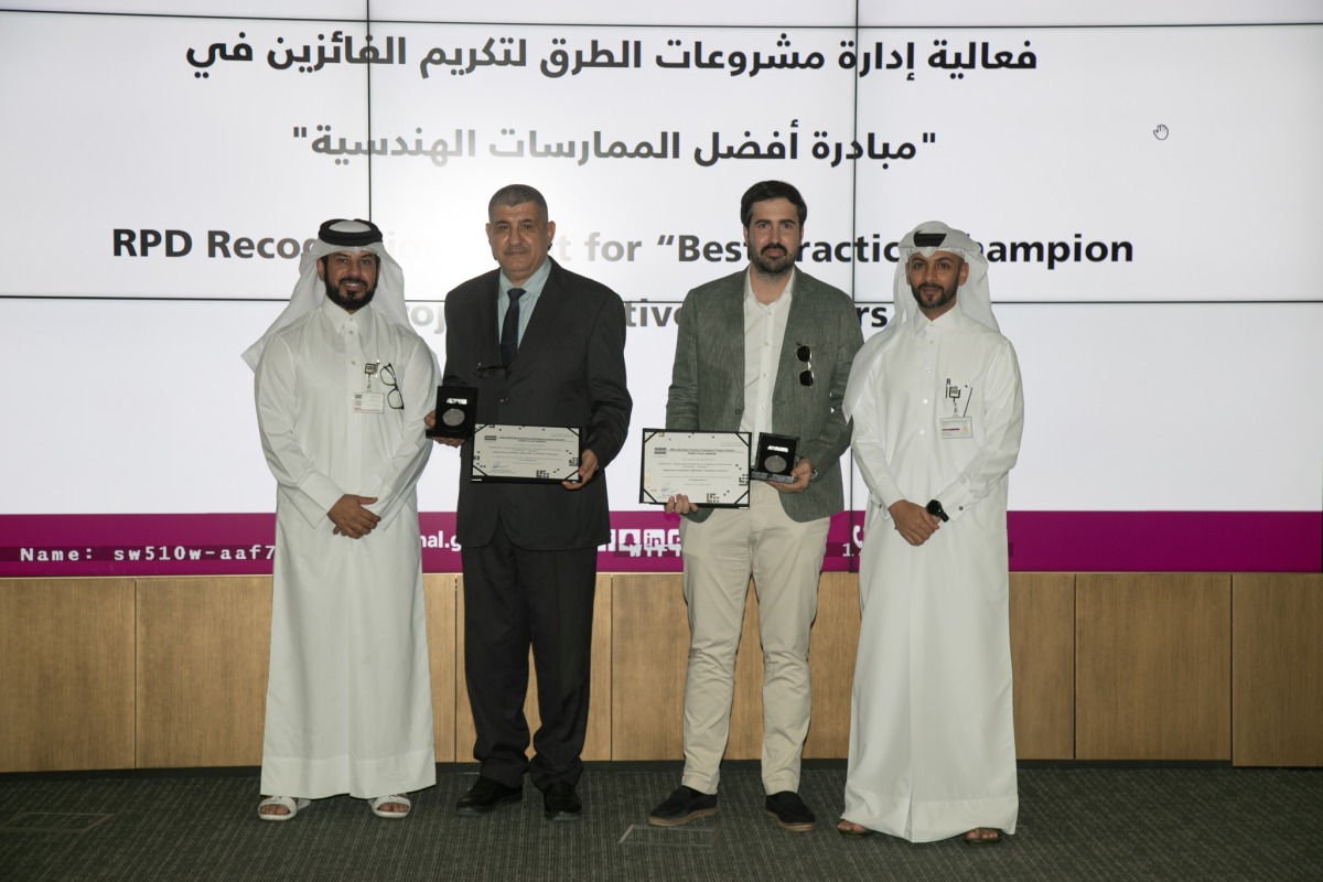 Ashghal  officials and honourees during the ceremony.