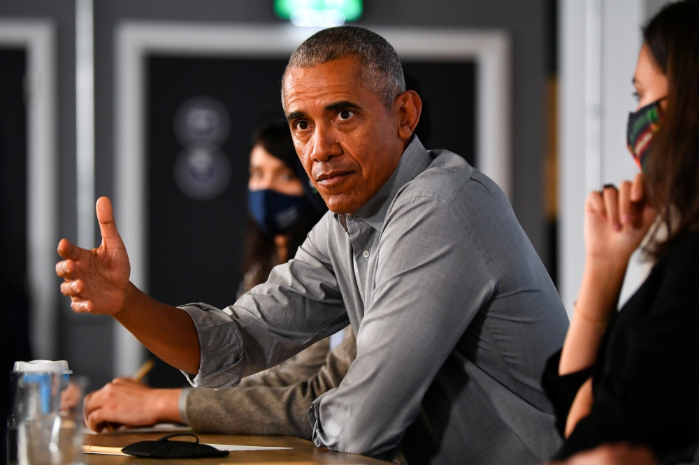 U.S. former President Barack Obama speaks as he attends a round table meeting at Strathclyde University during the UN Climate Change Conference (COP26), in Glasgow, Scotland, Britain, November 8, 2021. Reuters/Dylan Martinez