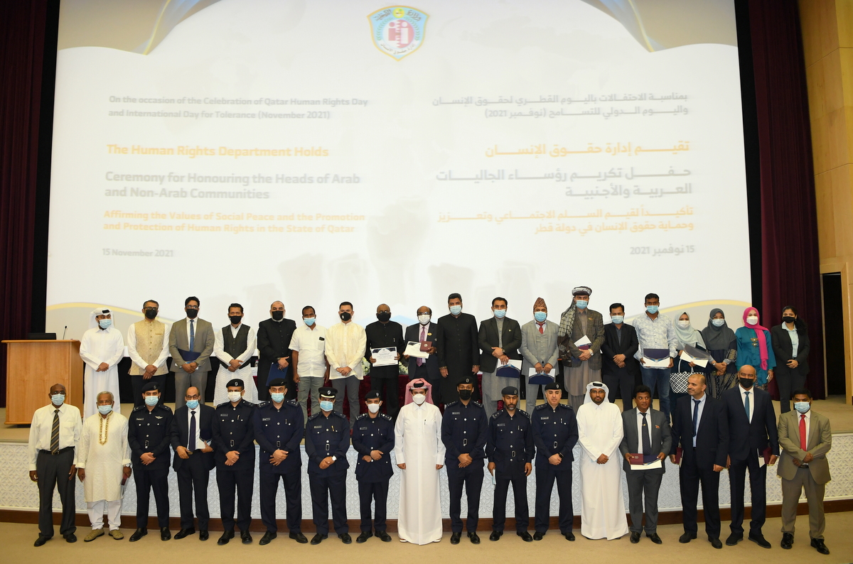 Officials from the MoI and the Ministry of Foreign Affairs with community leaders at an honouring ceremony yesterday. 