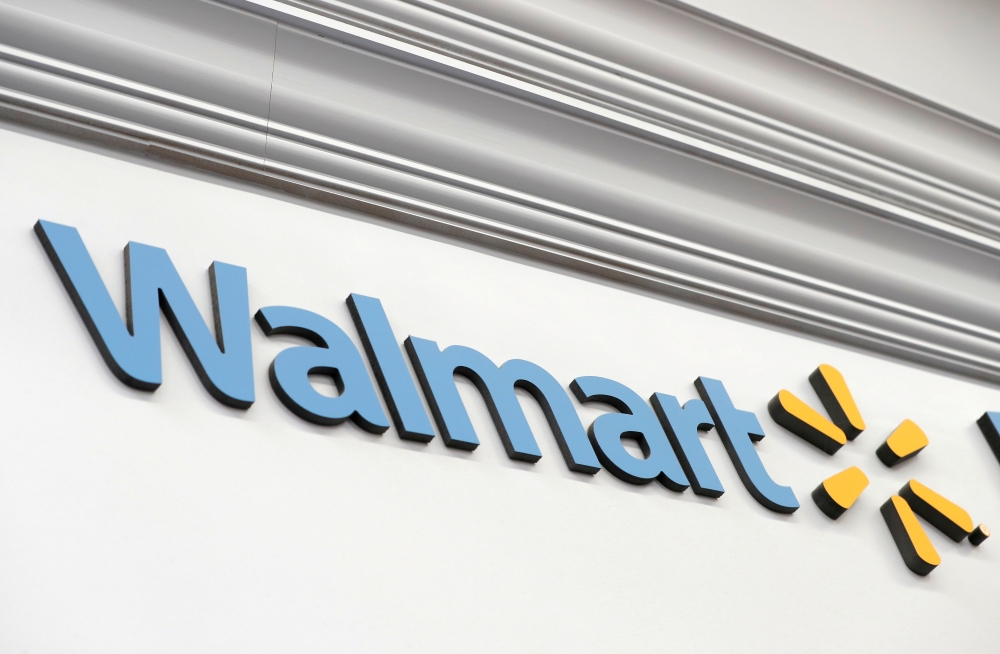 A Walmart sign is seen inside its department store in West Haven, Connecticut, U.S., February 17, 2021. REUTERS/Mike Segar/File Photo