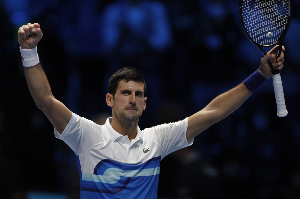 Serbia’s Novak Djokovic celebrates winning his group stage match against Russia’s Andrey Rublev REUTERS/Guglielmo Mangiapane