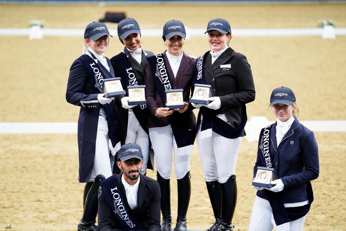 The podium winners of the second round of Longines Hathab Qatar Equestrian Tour Dressage.