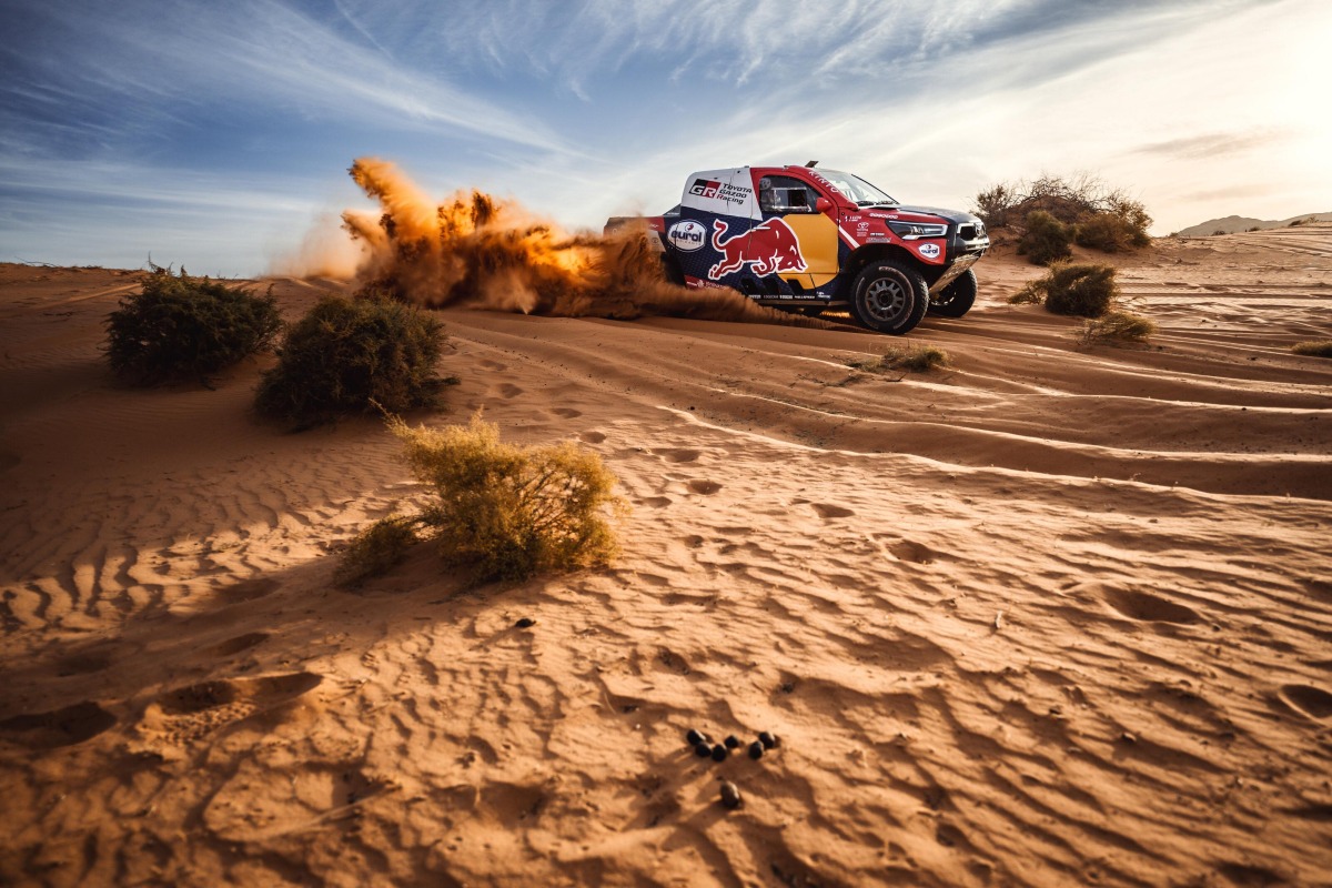 Nasser Al Attiyah and Mathieu Baumel drive their Toyota Hilux during the shakedown in Hail, Saudi Arabia, yesterday.