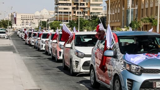 A rally of cars by Hot N Cool Group marking Qatar National Day.