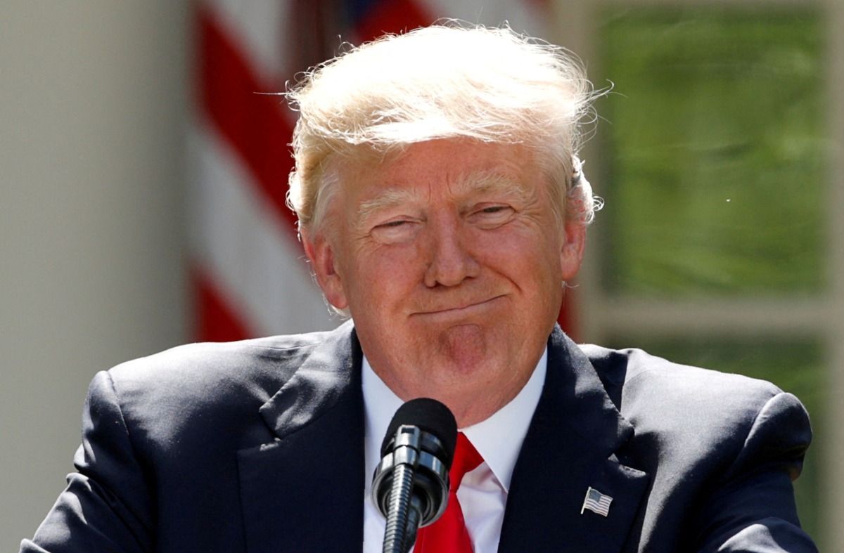 FILE PHOTO: U.S. President Donald Trump pauses as he announces his decision that the United States will withdraw from the landmark Paris Climate Agreement, in the Rose Garden of the White House in Washington, U.S., June 1, 2017. REUTERS/Kevin Lamarque/File Photo
