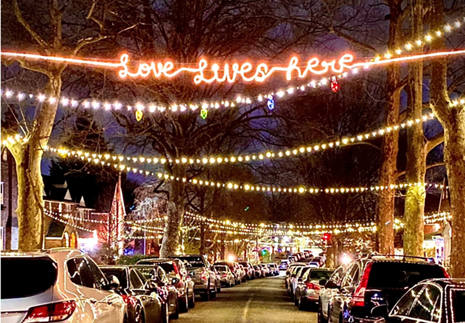 Residents in the Rodgers Forge neighborhood in Baltimore County last year strung Christmas lights from one side of the street to the other to show a struggling neighbor that she was not alone. Pic by Leabe Commisso
