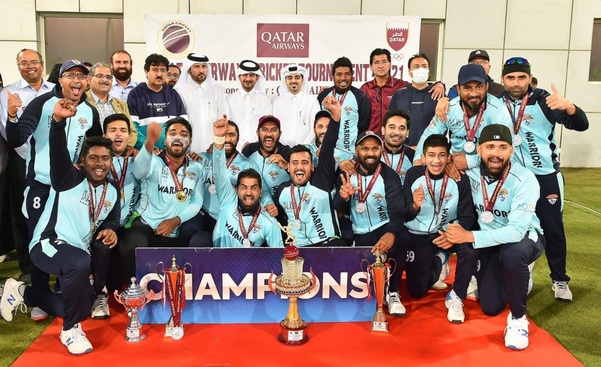 Warriors Club players and QCA officials pose for a group photo after the final. Pic: Abdul Basit