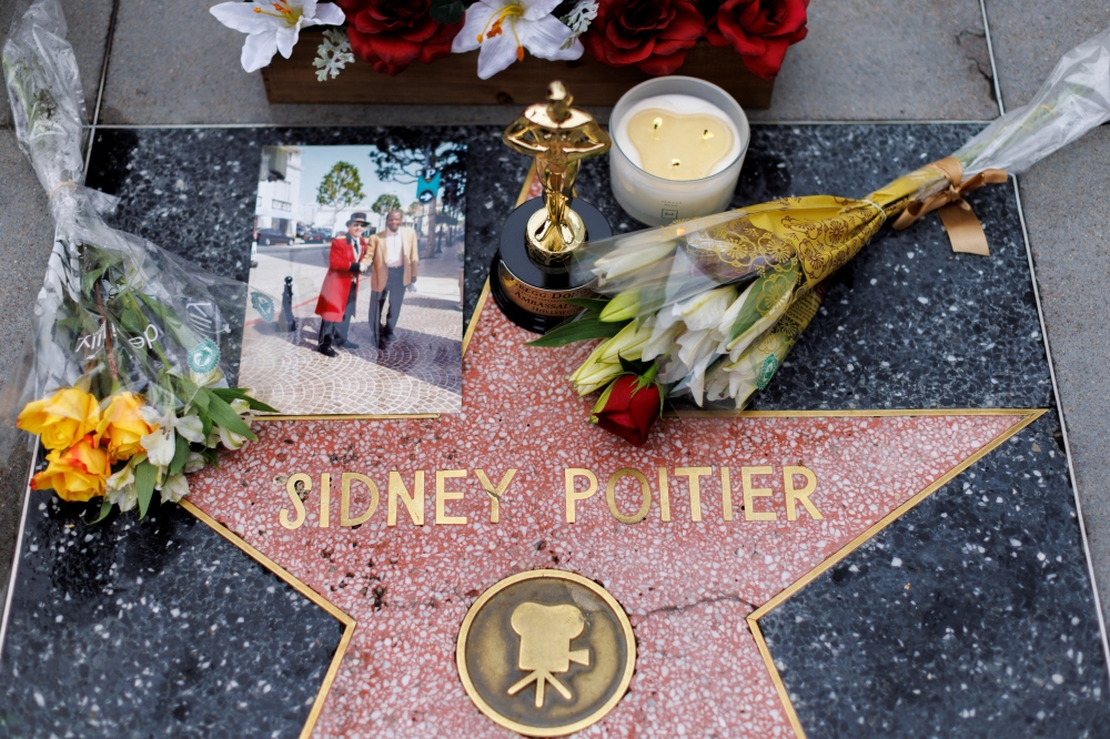 Following the announcement of the actor's death, Sidney Poitier's Star is shown on Hollywood Boulevard's 