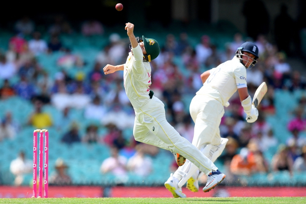Australia's Marnus Labuschagne attempts a catch from England's Stuart Broad Dan Himbrechts/AAP Image via REUTERS
