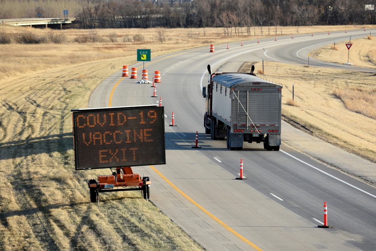 FILE PHOTO: Manitoba-based truckers, transporting goods to and from the United States, are being vaccinated against coronavirus disease (COVID-19) as part of a deal between the Canadian province and the state of North Dakota, at a rest stop near Drayton, North Dakota, U.S. April 22, 2021. REUTERS/Dan Koeck/File Photo

