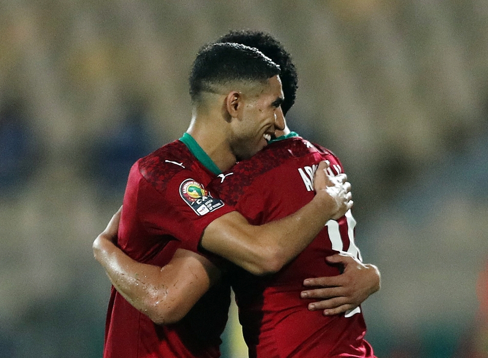 Morocco's Achraf Hakimi and Sofyan Amrabat embrace after the match REUTERS/Mohamed Abd El Ghany
