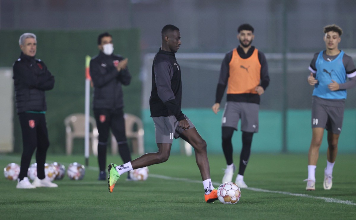 Al Duhail's Almoez Ali trains with team-mates.