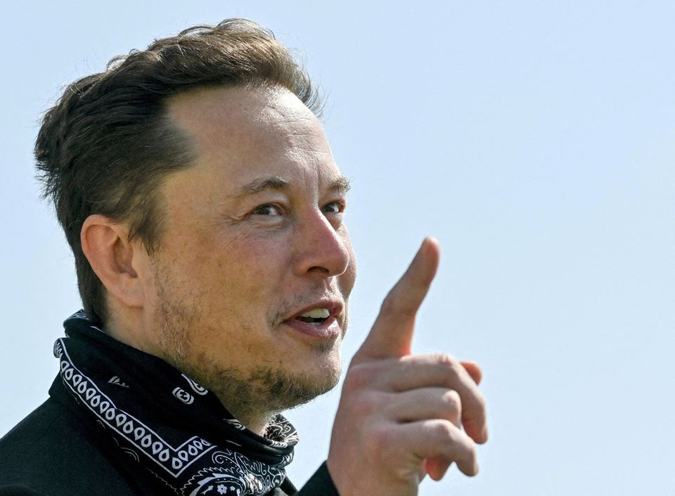 Tesla CEO Elon Musk gestures as he visits the construction site of Tesla's Gigafactory in Gruenheide near Berlin, Germany, August 13, 2021. Patrick Pleul/Pool via Reuters

