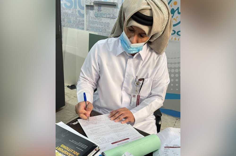 An official registering a violation during the raid.