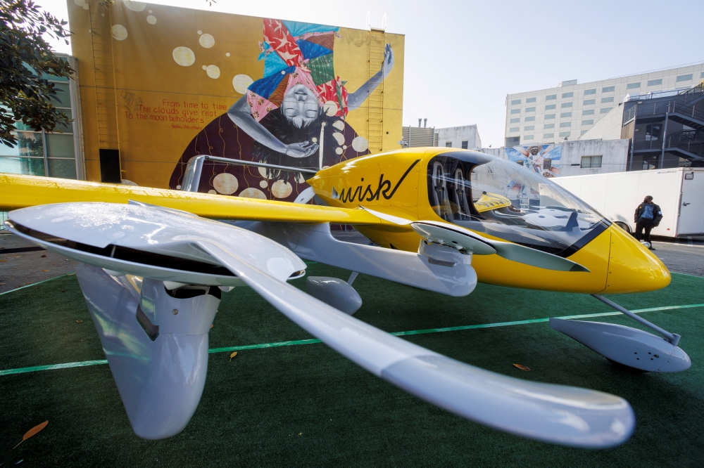 FILE PHOTO: The Wisk aircraft, a joint venture between The Boeing Company and Kitty Hawk Corporation, is shown on display as the innovative transportation and technology conference CoMotion LA is set to begin in Los Angeles, California, U.S. November, 16, 2021. REUTERS/Mike Blake