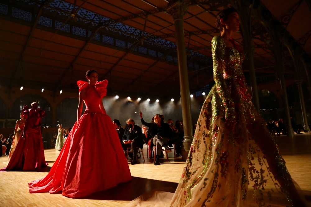 Models present creations by designer Elie Saab as part of his Haute Couture Spring/Summer 2022 collection show in Paris, France, January 26, 2022. REUTERS/Violeta Santos Moura
