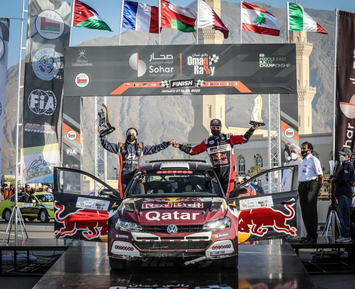 Nasser Saleh Al Attiyah and his co-driver Alba Sánchez González celebrate after winning the Oman Rally.