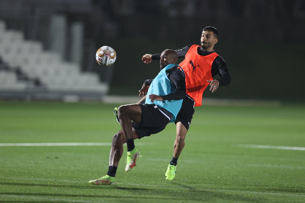 Al Sadd's Abdelkarim Hassan and Boualem Khoukhi during a training session yesterday.