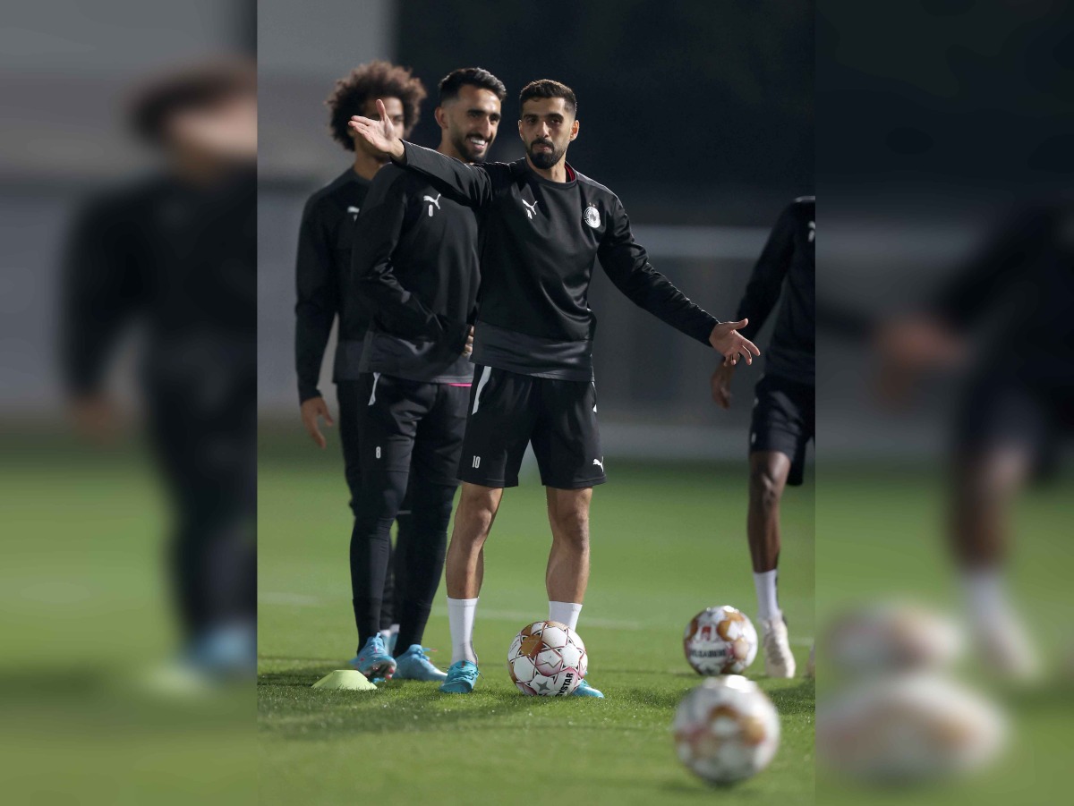 Al Sadd captain Hassan Al Haydos (foreground) with team-mates during a training session.