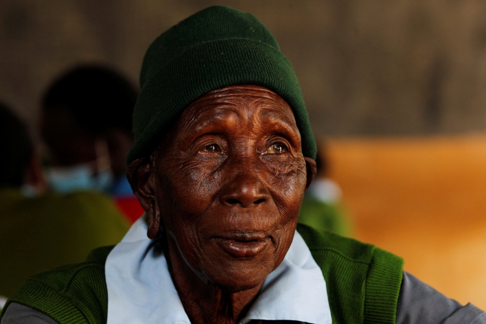 Priscilla Sitienei, a 98-year-old primary school student in grade six, attends a lesson at the Leaders Vision Preparatory School in Ndalat village of Nandi County, Kenya January 25, 2022. Picture taken January 25, 2022. REUTERS/Monicah Mwangi