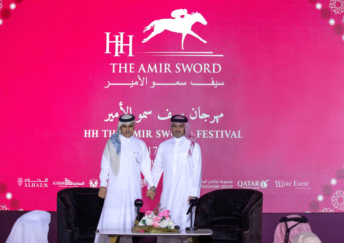 Acting CEO of QREC Bader Mohamed Al Darwish (right) and CEO of Al Emadi Enterprises and Al Hazm Mohamed Abdul Karim Al Emadi during the draw ceremony for HH The Amir Sword Festival yesterday.