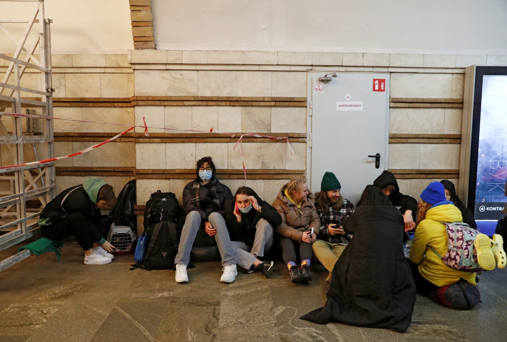 People take shelter in a subway station, after Russian President Vladimir Putin authorized a military operation in eastern Ukraine, in Kyiv, Ukraine on February 24, 2022. (Reuters/Valentyn Ogirenko)