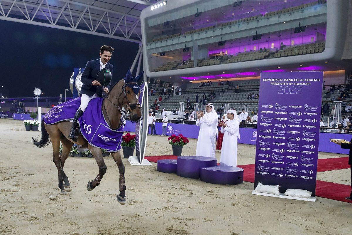 Brazil’s Marlon Modolo Zanotelli celebrates after winning the feature class with Like A Diamond van het Schaeck, yesterday. Omar Al Mannai, Event Director, Commercial Bank CHI Al Shaqab Presented by Longines, and Hussein Ali Al Abdulla, EGM & Chief Marketing Officer, Commercial Bank, are also present. Pictures: CHI Al Shaqab
