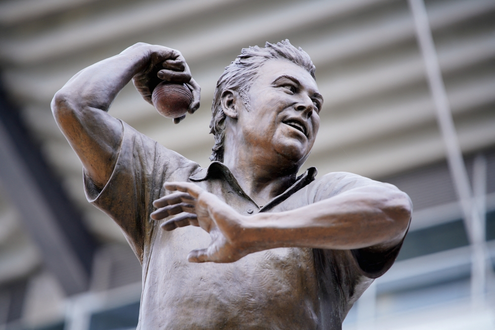 A statue of the late cricketer Shane Warne is seen outside the Melbourne Cricket Ground (MCG) in Melbourne, Australia, March 5, 2022. )REUTERS/Sandra Sanders)