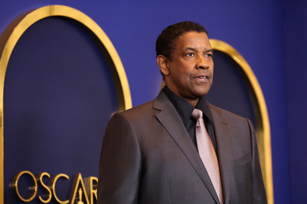 Actor Denzel Washington attends the 94th Oscars Nominees Luncheon in Los Angeles, California, U.S., March 7, 2022. REUTERS/Mario Anzuoni