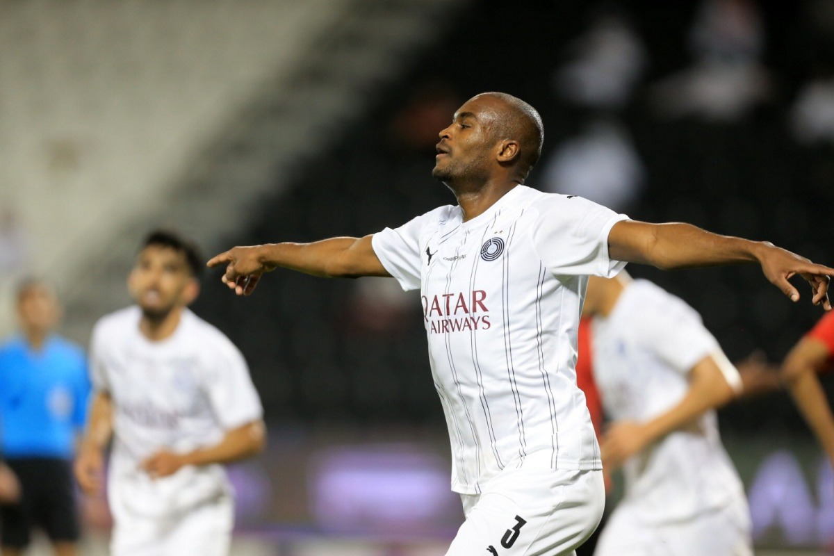 Al Sadd's Abdelkarim Hassan celebrates after scoring a  goal against Al Rayyan yesterday.