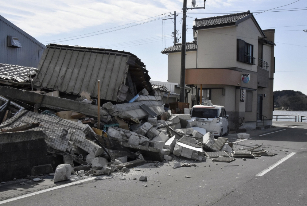 A damaged building following a strong earthquake is pictured in Soma, Fukushima prefecture, Japan in this photo taken by Kyodo on March 17, 2022. Mandatory credit Kyodo/via REUTERS 