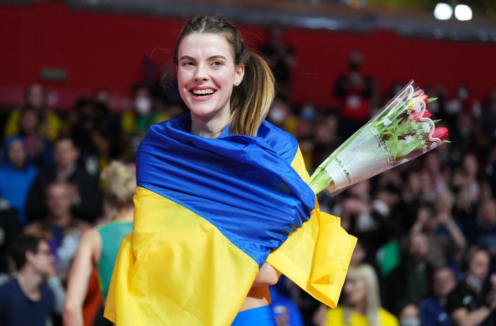 Ukraine's Yaroslava Mahuchikh celebrates winning the women's high jump final (REUTERS/Aleksandra Szmigiel)