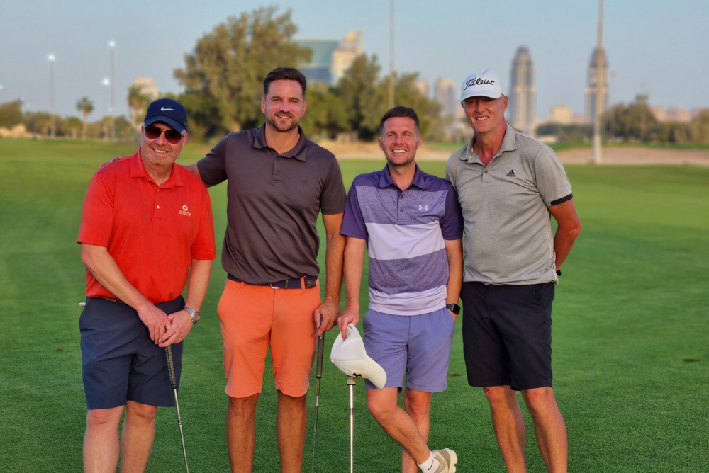 Winner Danny Langfield (2nd from left) with other players.