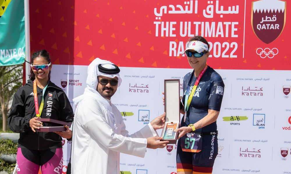 Qatar Olympic Committee (QOC) President, H E Sheikh Joaan bin Hamad Al Thani crowns the winners of the QOC Ultimate Race 2022 at the Cultural Village Katara, yesterday.
