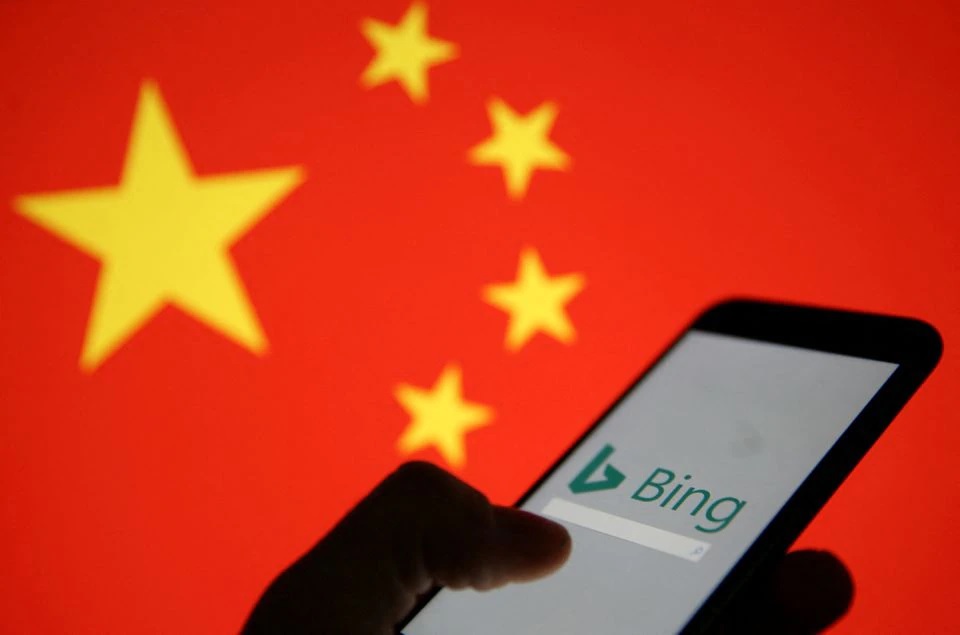 A smartphone with the Microsoft Bing logo is displayed against the backdrop of a Chinese flag in this picture illustration taken January 24, 2019. REUTERS/Dado Ruvic/Illustration/

