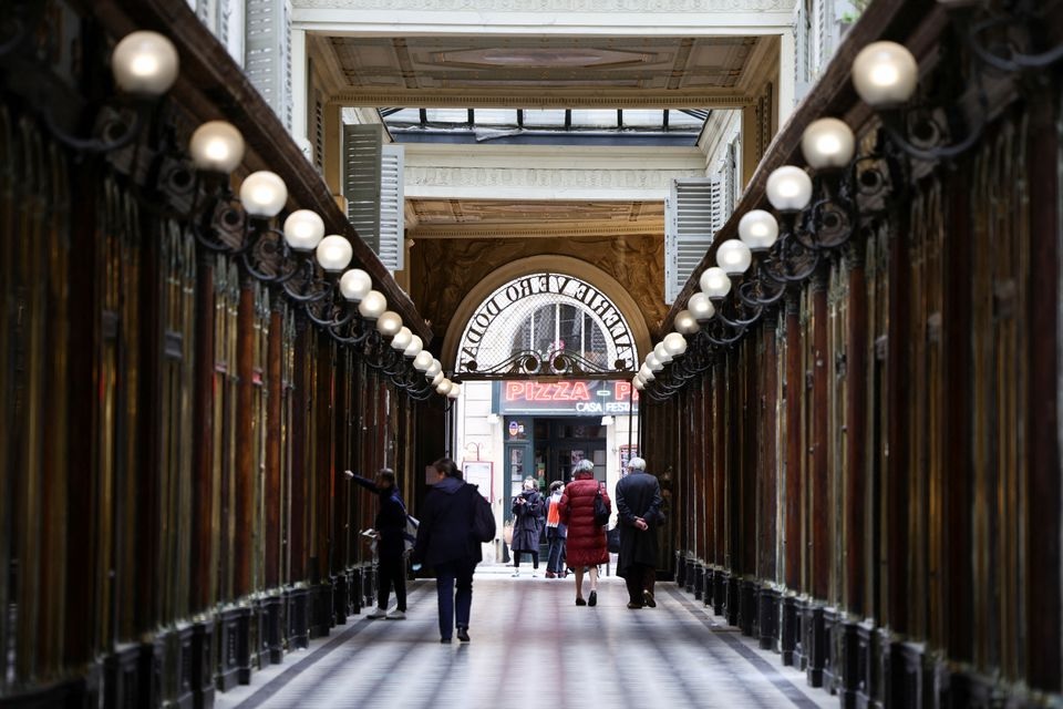 People walk in the Galerie Vero-Dodat covered arcade in Paris, France, February 23, 2022. REUTERS/Sarah Meyssonnier

