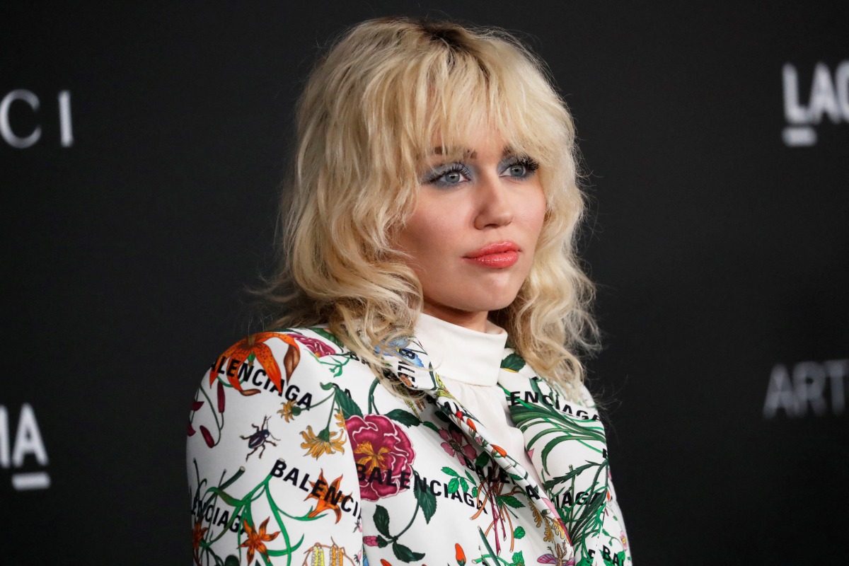 FILE PHOTO: Singer Miley Cyrus poses at the LACMA Art+Film Gala in Los Angeles, California, U.S. November 6, 2021. REUTERS/Mario Anzuoni/File Photo
